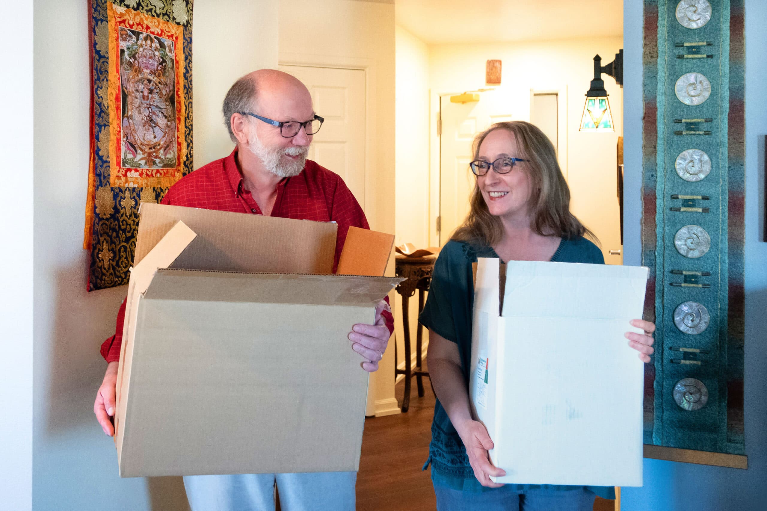 Couple with moving boxes