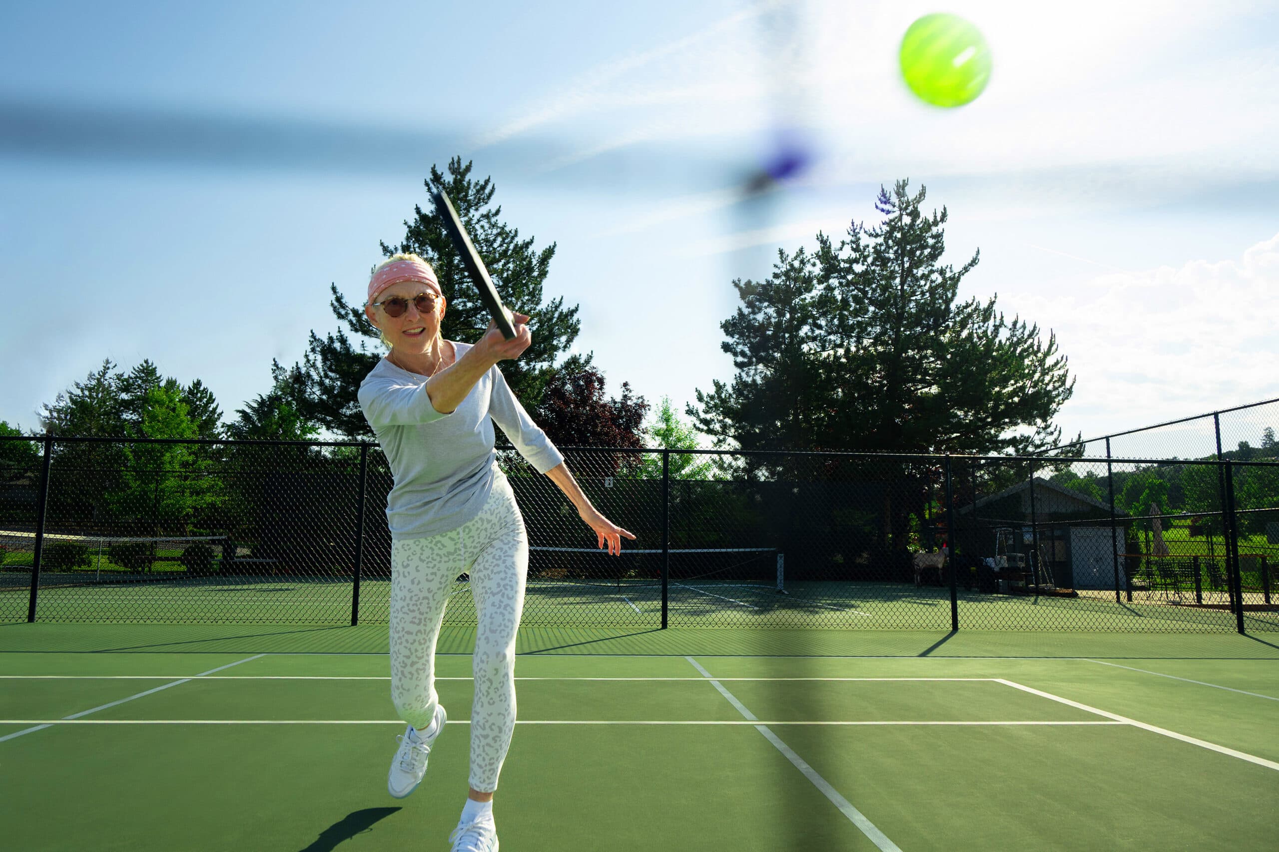 Woman playing pickleball
